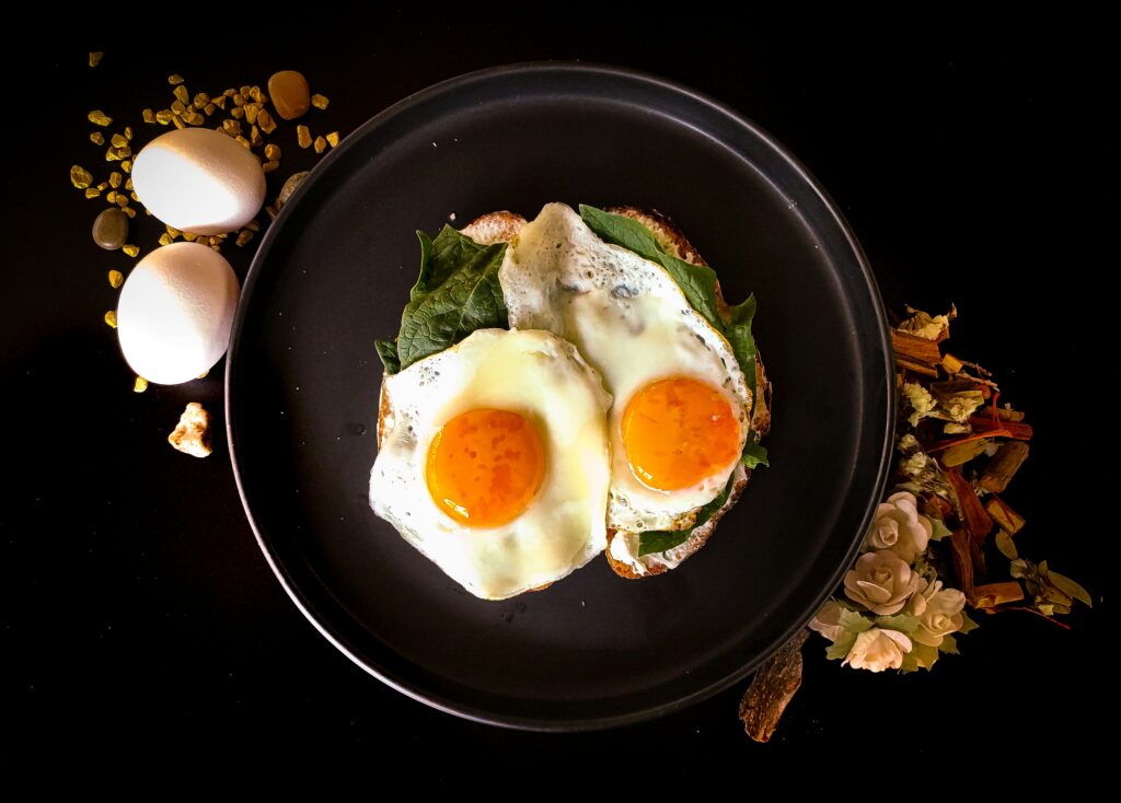 cooked eggs in sauce pan